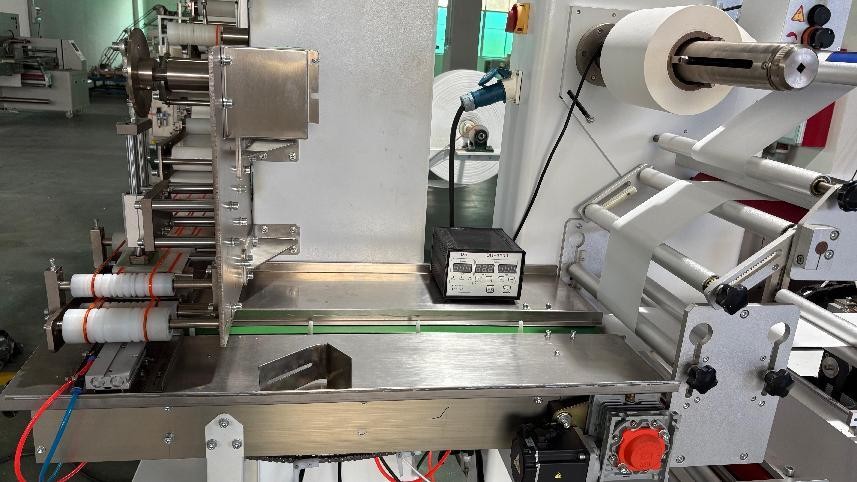 380V 50Hz Wet Towel Folding Slitting Packing Machine Automatic Towel Roll Packaging Line