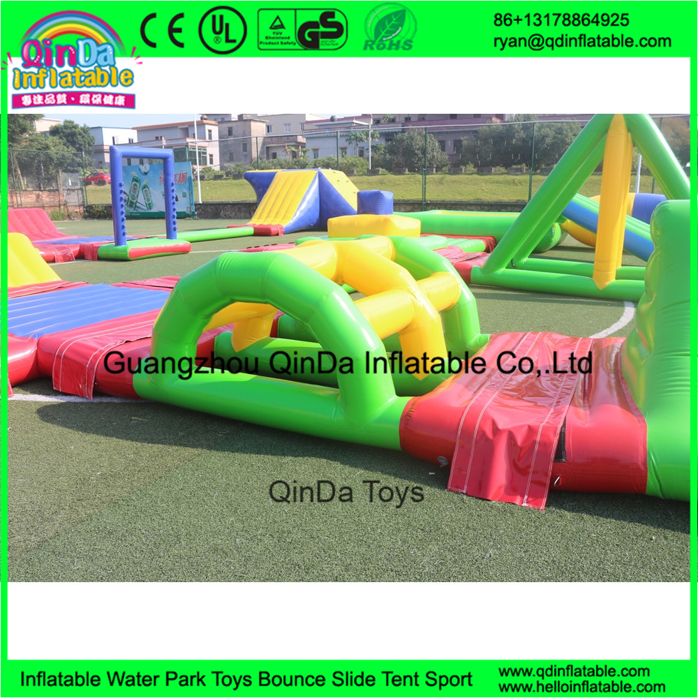 Custom design outdoor adults giant inflatable floating water park for open water entertainment from Guangzhou