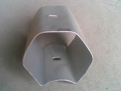 A hexagonal hollow offset block is placed on the ground.