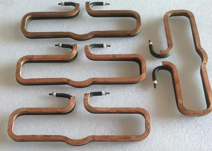 Manifold sheath heater with copper stip