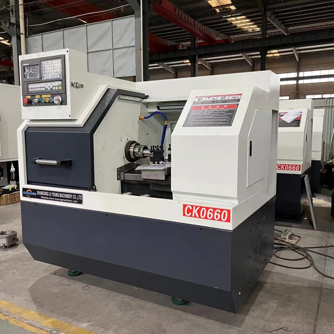 Metal Processing CNC Lathe Machine Ck0660 Gang Type Tool Holder Hydraulic Chuck Collect