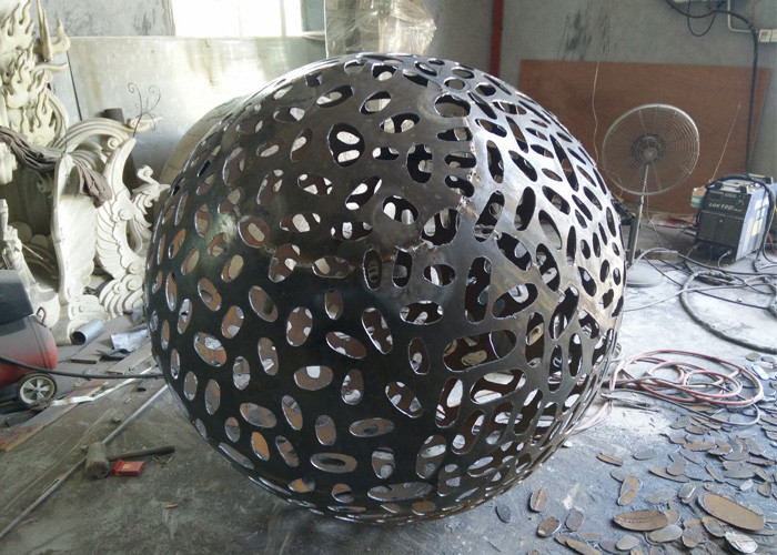 Delicate Corten Steel Carved Hollow Ball Sculpture For Garden Decoration