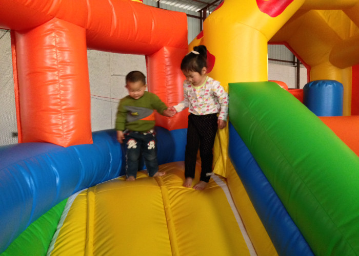 Cute inflatable dinosaur fun amusement park for kids inflatable little dino fun city on land