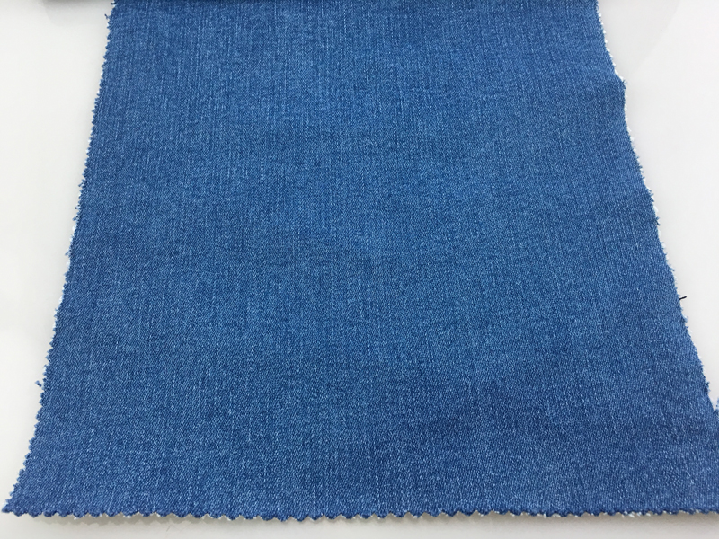 11.9oz 55.5 inch Stonewashed Denim Fabric 64% Cotton 23% Poly 10% Rayon 3% Spandex