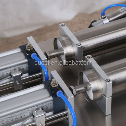 DUOQI Y2WTD Double Nozzle Liquid Filling Machine for Shampoo and Juice at 0.4 Mpa Pressure