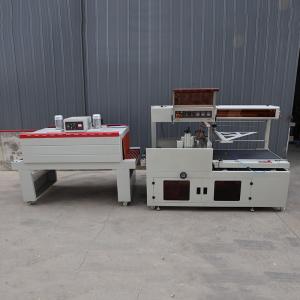 China Sealing Cutting Heat Shrink Packaging Machine POF / PE Film Wrapping Machine ISO9001 on sale