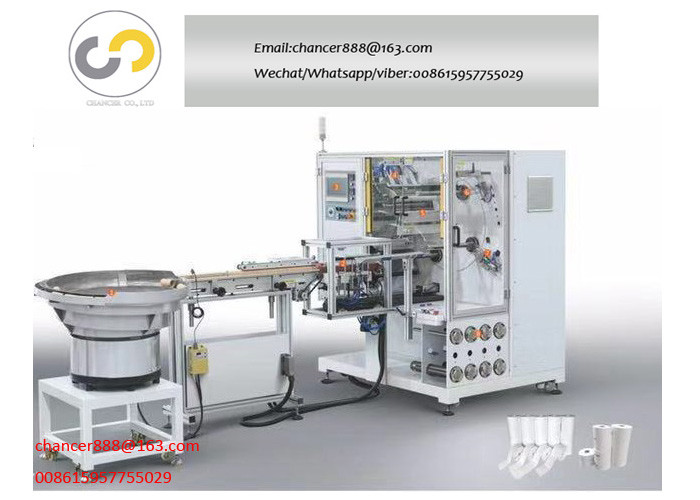 Automatic rotating tower label rewinding machine with automatic paper feeding system