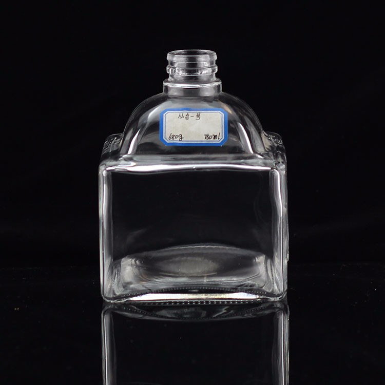 Industrial 700ml Glass Bottle for Beverage Industry in Thumb Shape