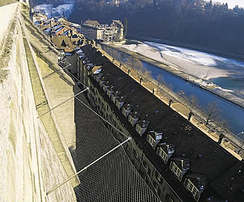 Stainless steel safety net mounted below a high building to prevent self-slayers, small kinds and pet falling down to the ground directly and losing their life in the end.