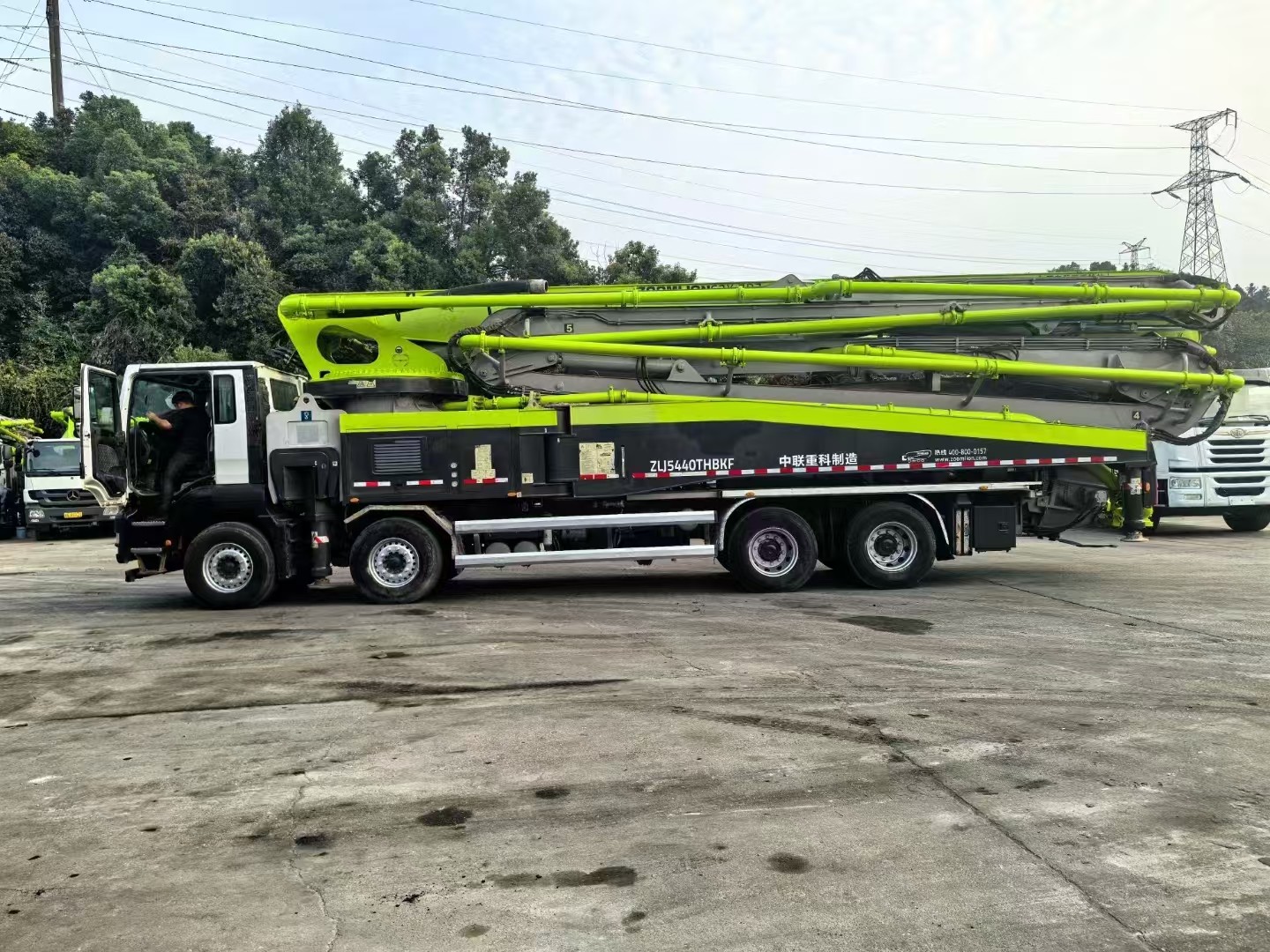 Zoomlion ZLJ5440THBKF 63m 2020 Sitrak Chassis White And Green Used Concrete Pump Truck In Good Condition