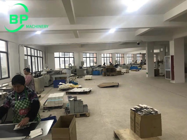 China notebook spiral binding machine working in customer factory