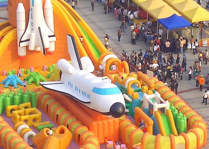 Orange Space Shuttle Inflatable Obstacle Course Sports Games 30m Long Interactive