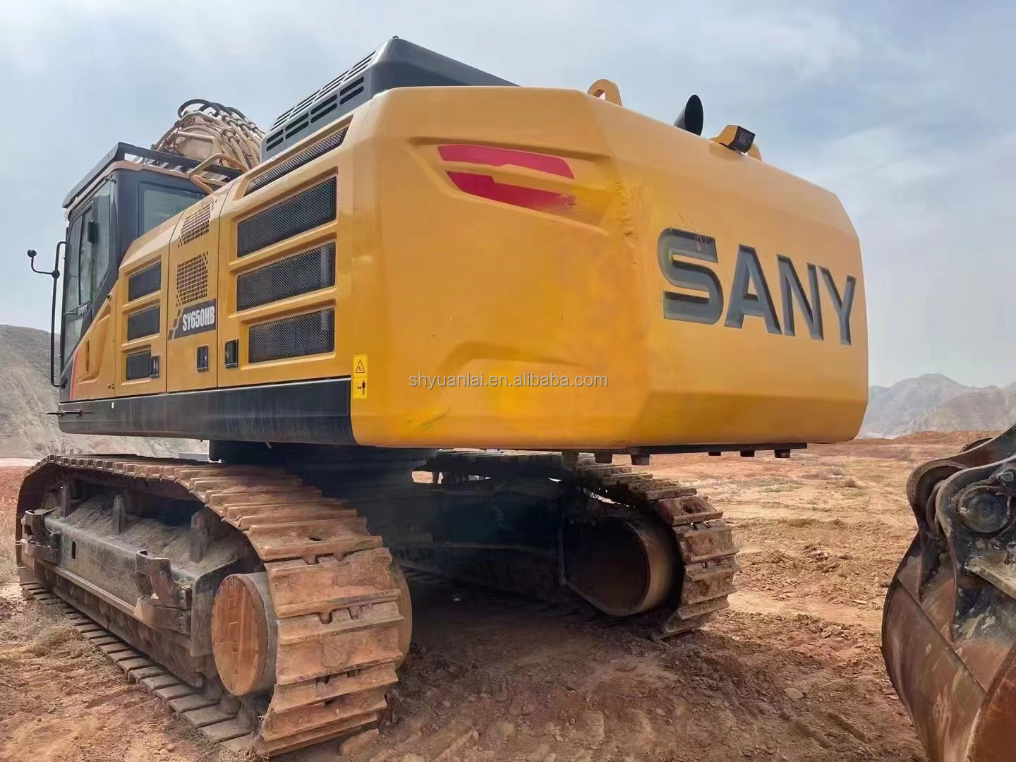 Low price sale of original hydraulic track type Sany SY650 second-hand excavator and hook machine