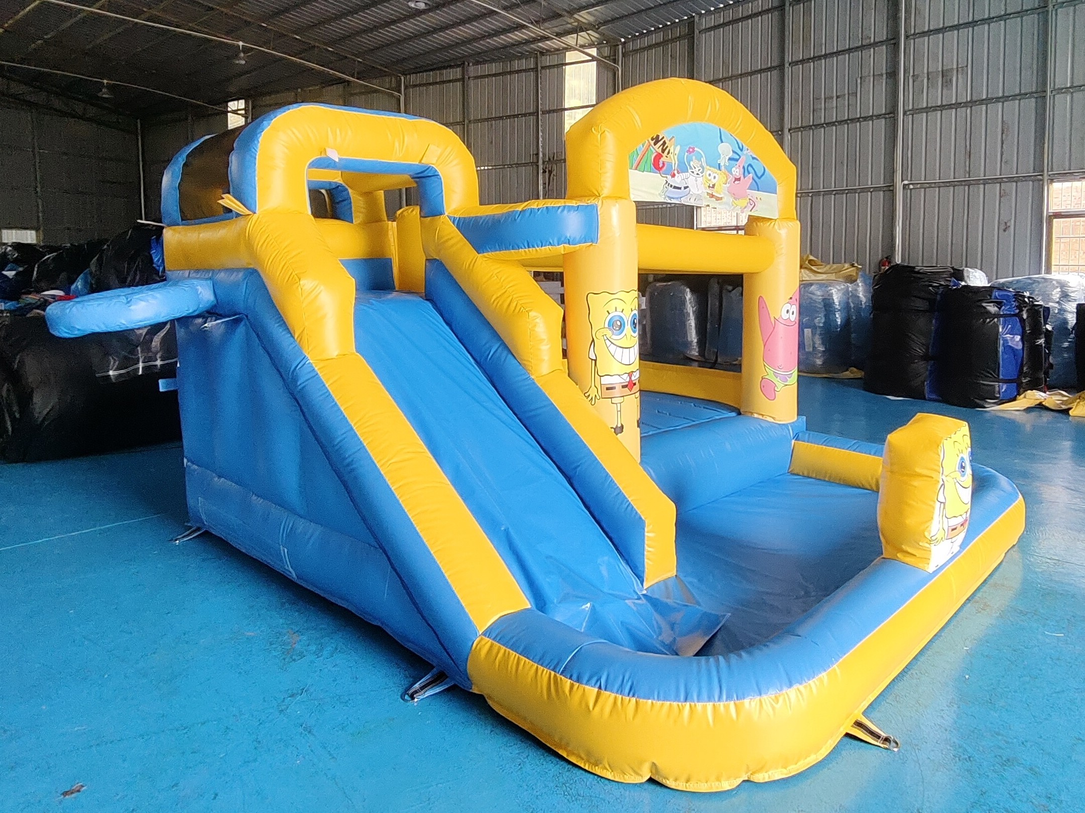 Commercial Fireproof Inflatable Combo SpongeBob SquarePants Bounce House With Slides Inflatable Water Jumping House