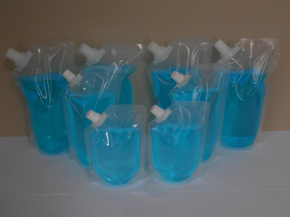 k transparent spouted pouches packaging for fruit juice / milk