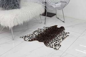 China Animal Printed Faux Animal Shaped Rugs Carpet Large Cow Hide Floor Rug For Living Room on sale