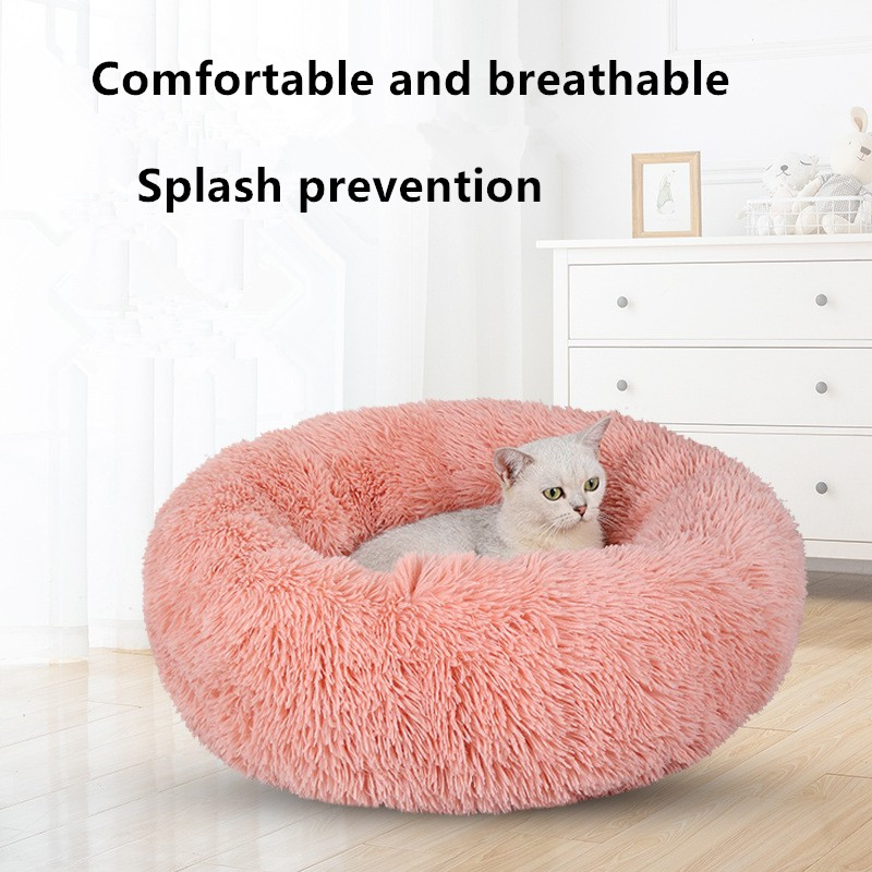 pink fluffy dog bed