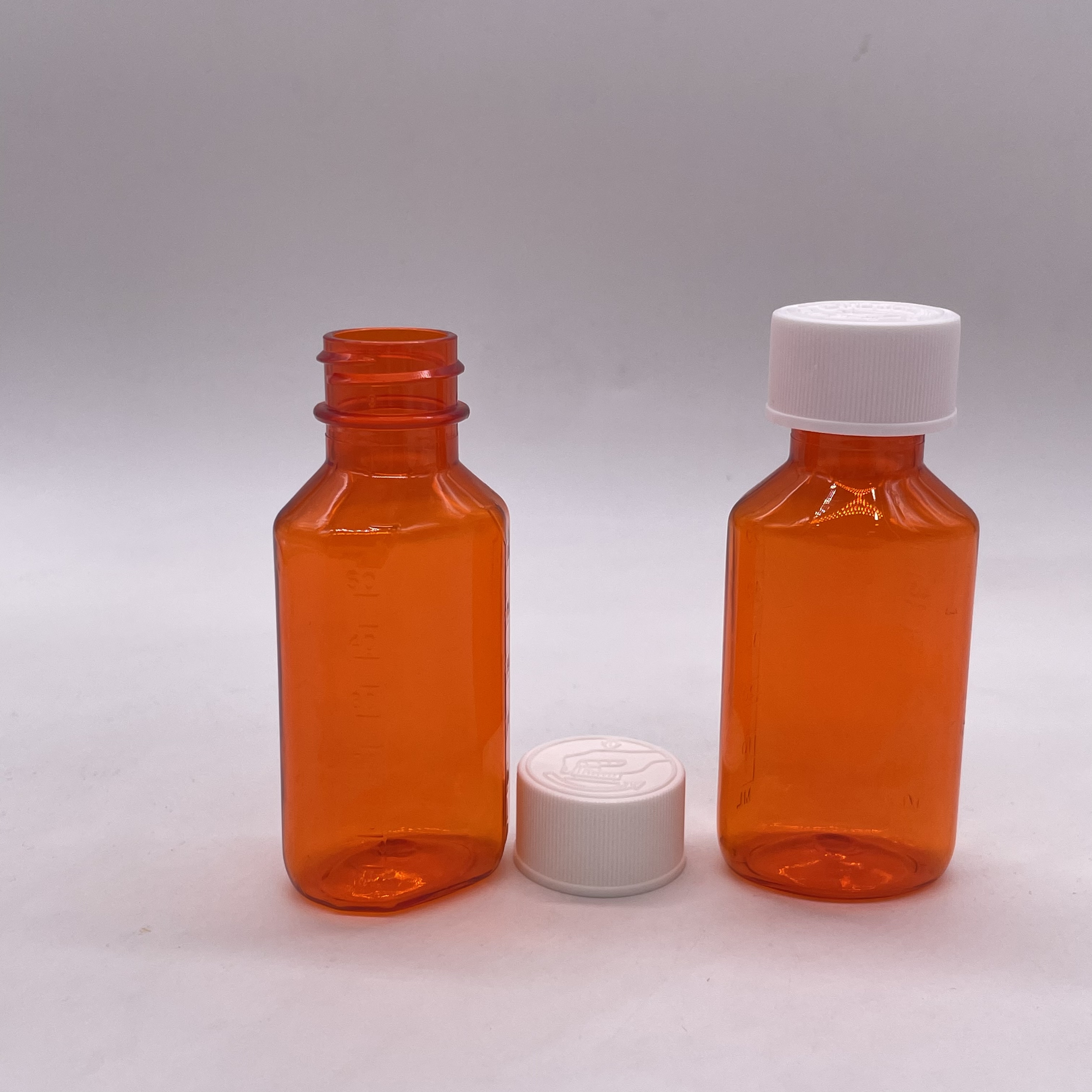 Accurate Dosage 2OZ Plastic Medicine Bottle with Child Resistant Cap and Measurement Scale