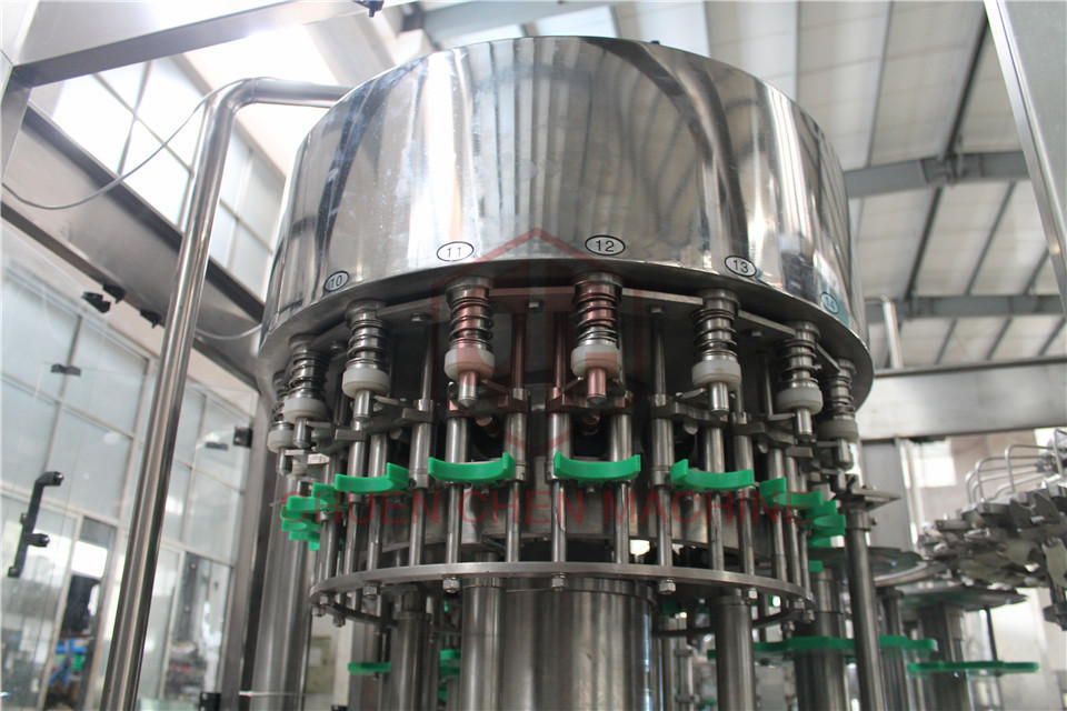 Double Head Liquid Bottle Filling Machine Rotary Volumetric Bottle