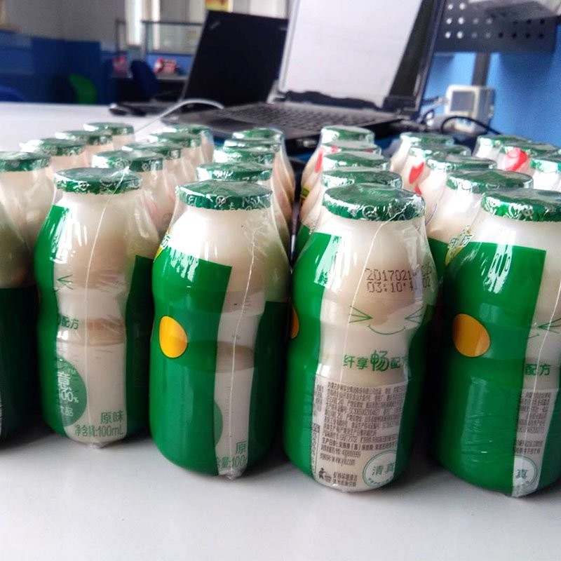 380V Grouping Automatic Screw Feeder Machine Collective Milk Packaging Line