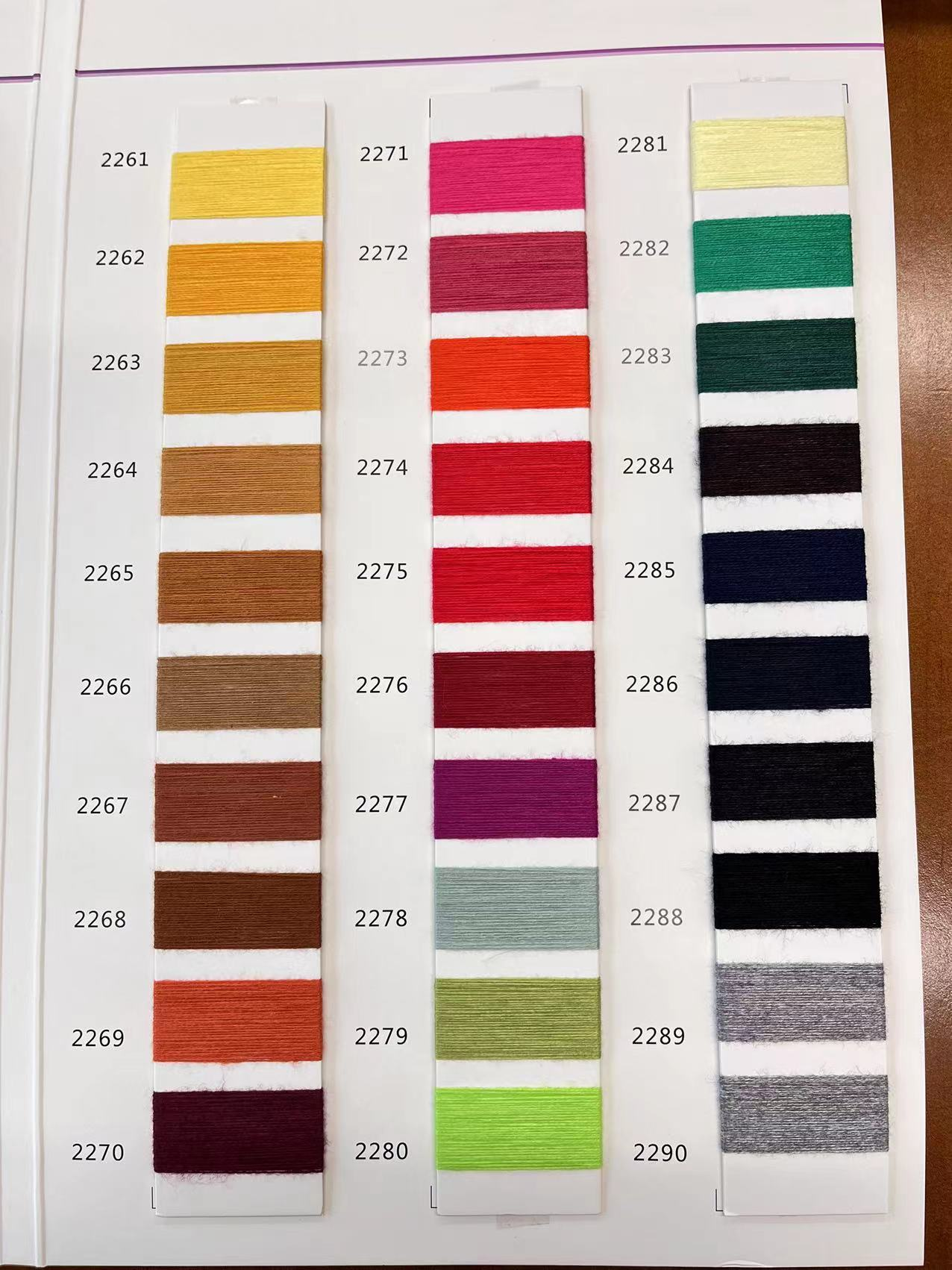 Very soft and flexible knitted yarn 28S/2 VISCOSE NYLON PBT 200 colors of core-spun yarn for flat machine sweater