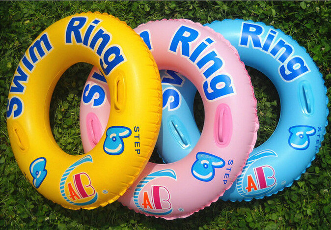 Inflatable swim ring with flowers
