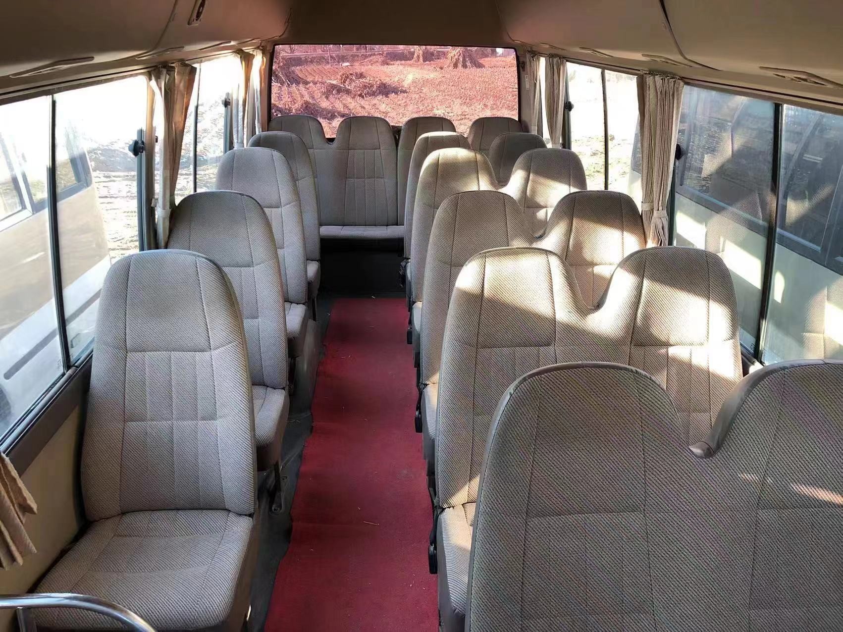 Toyota Coaster Used Bus 29 Seats Diesel Engine 100KW Folding Door Front Engine SCT6703