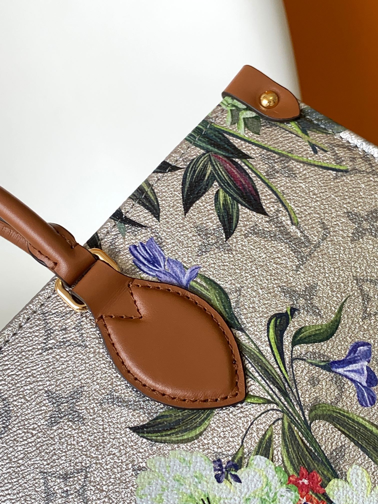 OnTheGo MM Mini Sling Bag Branded M81724 Floral Pattern Silver Coated Canvas