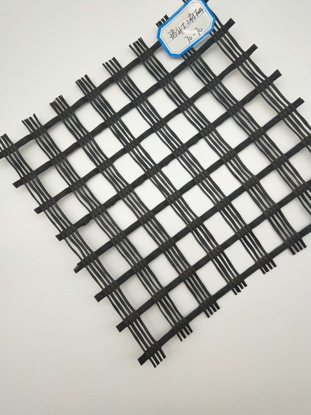 Lightweight Composite Pavement Reinforced by High Tensile Strength Fiberglass Geogrid