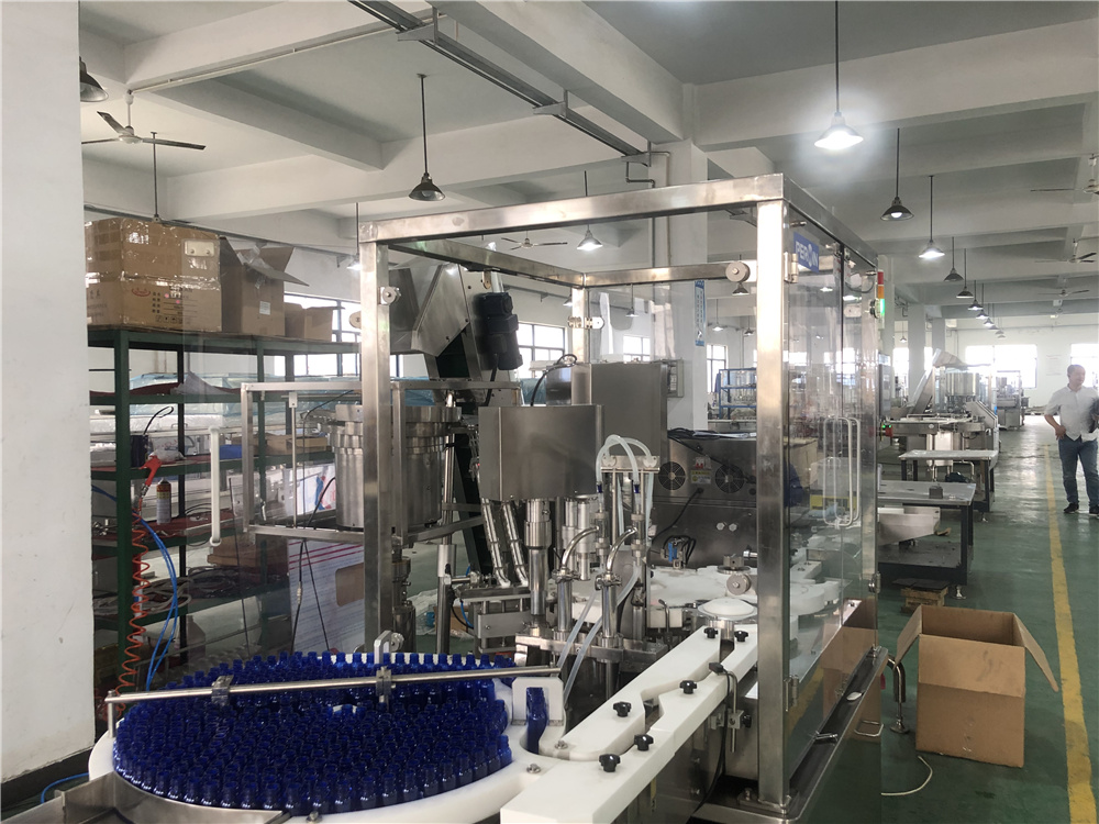 GMP 125ml Pharma Aseptic Rotary Bottle Filling Machine