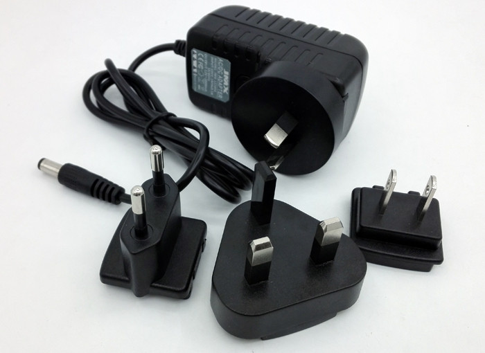 Interchangeable ac plug 12V 2A 1A 5V 2A 12v 5a power adapter with USA/Australia/Europe/UK plug dubai for LED .SET TOP