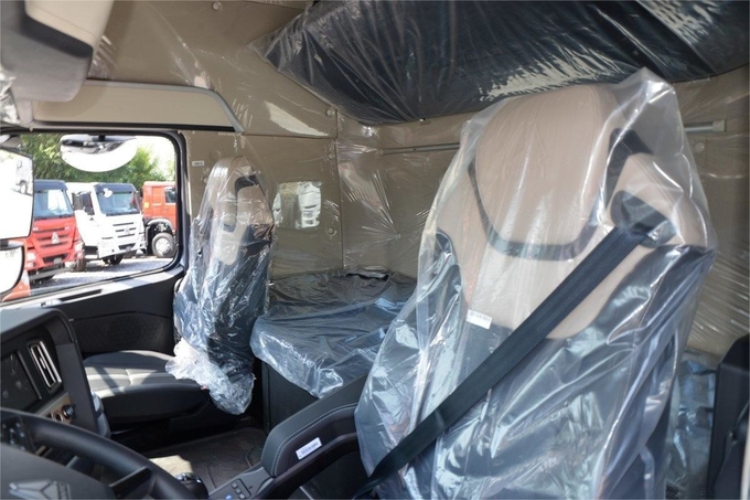 HOWO TH7 Truck 610HP 6*4 AMT Automatic Dangerous Goods Tractor Truck High Roof Deflector