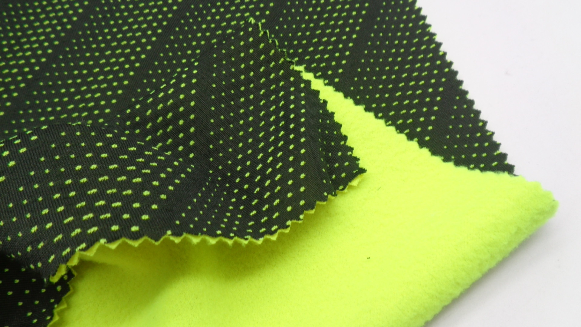Stretch Polyester Bird Eyes Mesh Knitted Bonded Garment Fabric 260G Windproof