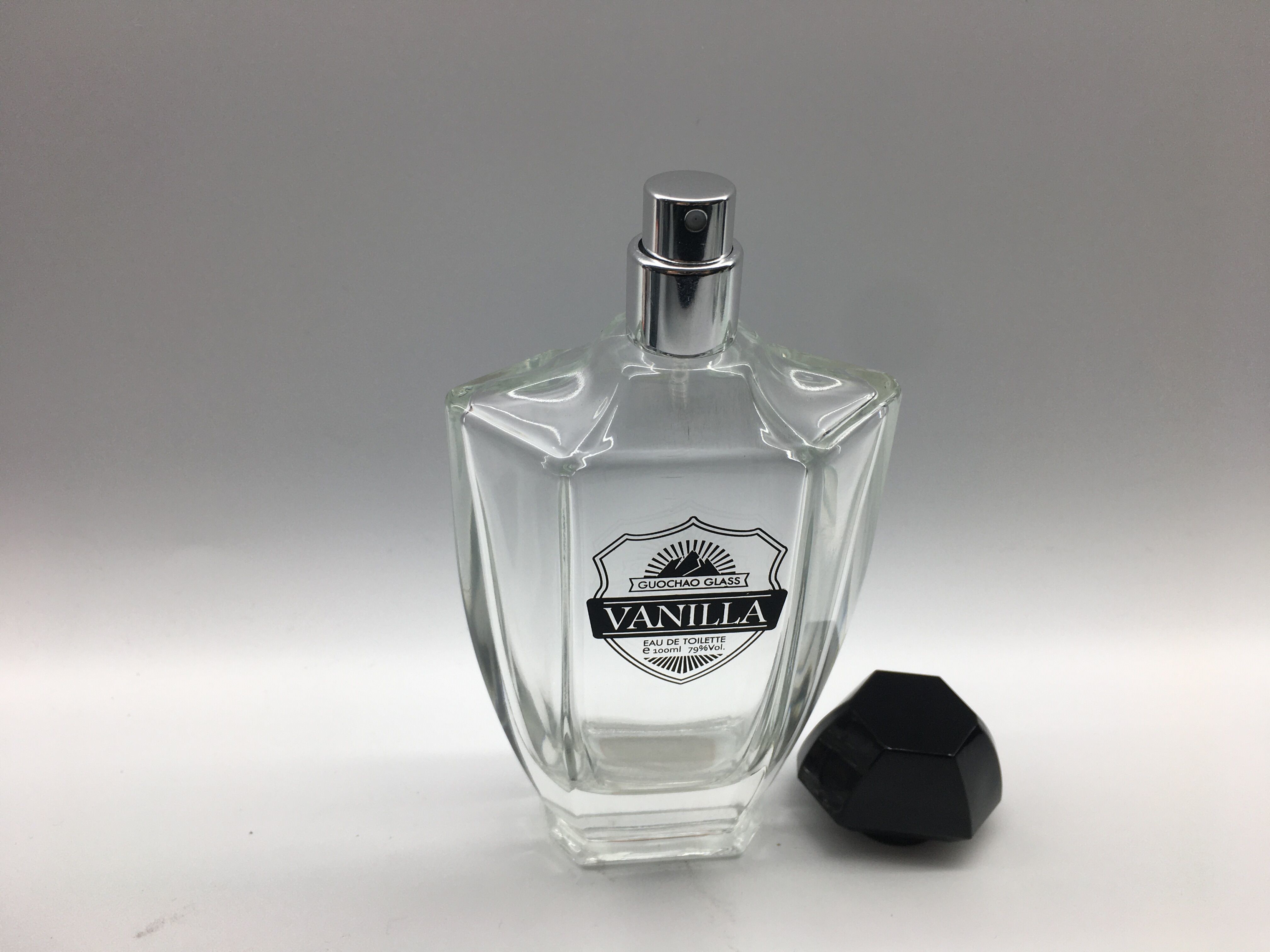 Irregular Cap Luxury Perfume Bottles OEM 100ml Clear Glass Atomizer Sprayer