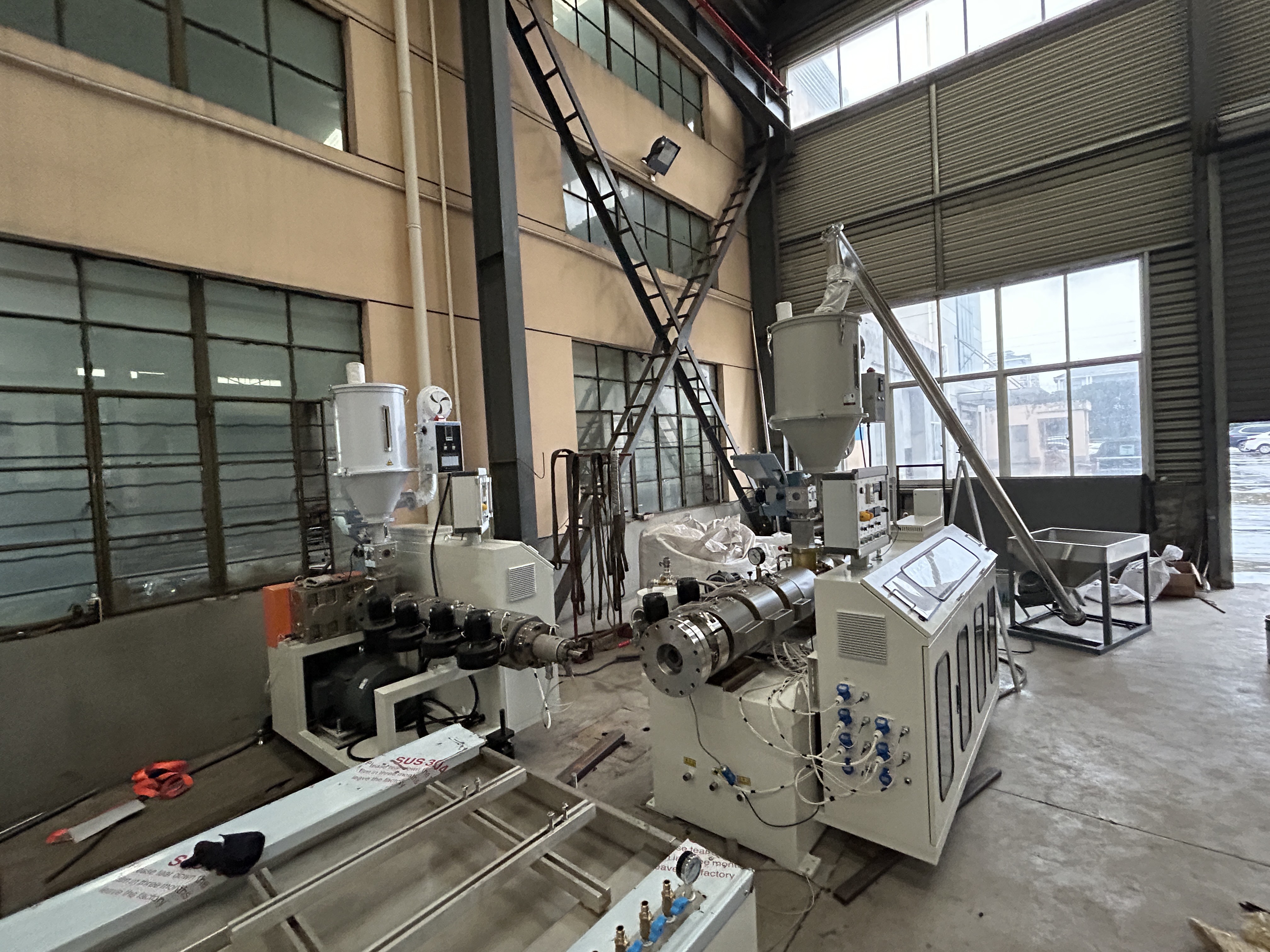 Reliable Wpc Profile Extrusion Line Energy Saving Motors Precise Temperature Control System