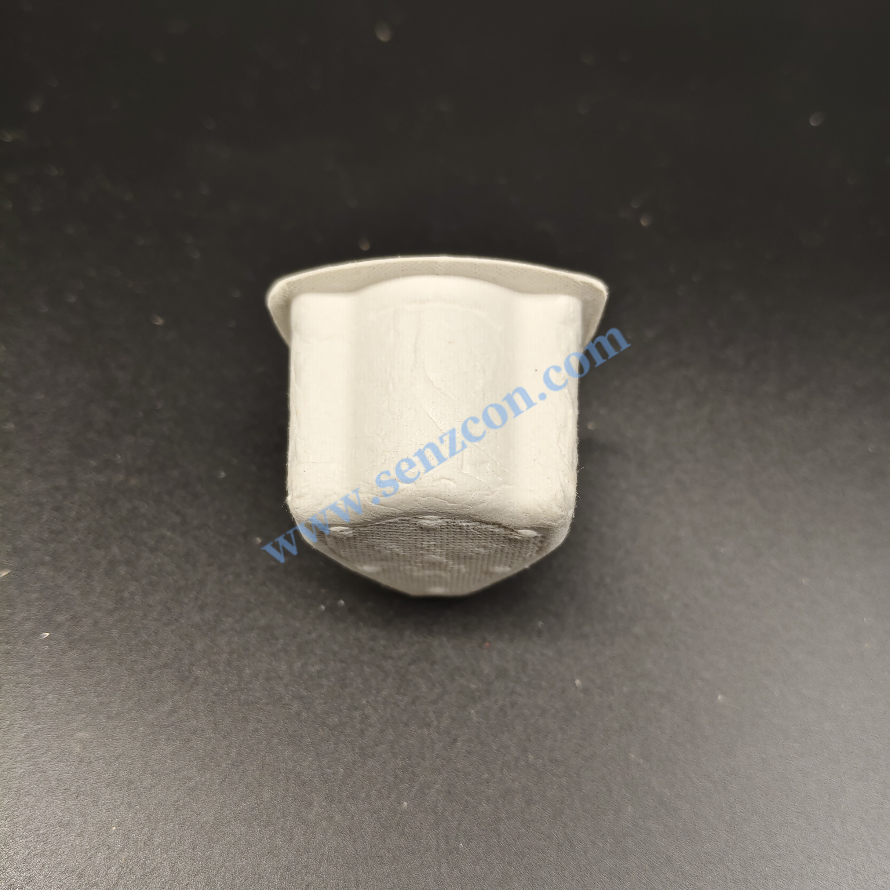 The environmentally friendly pulp - molded protective cover for triangular plugs complies with the plastic - ban regulations of Europe and the United