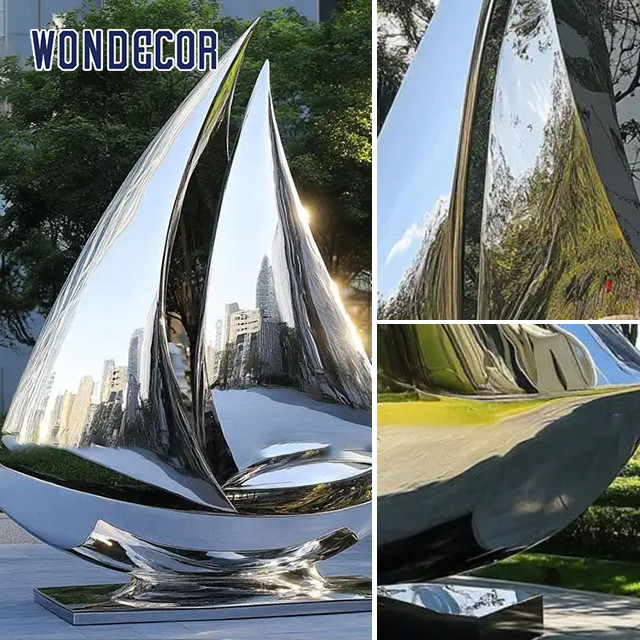 Ocean themed art decoration sculpture mirror stainless steel sailboat sculpture