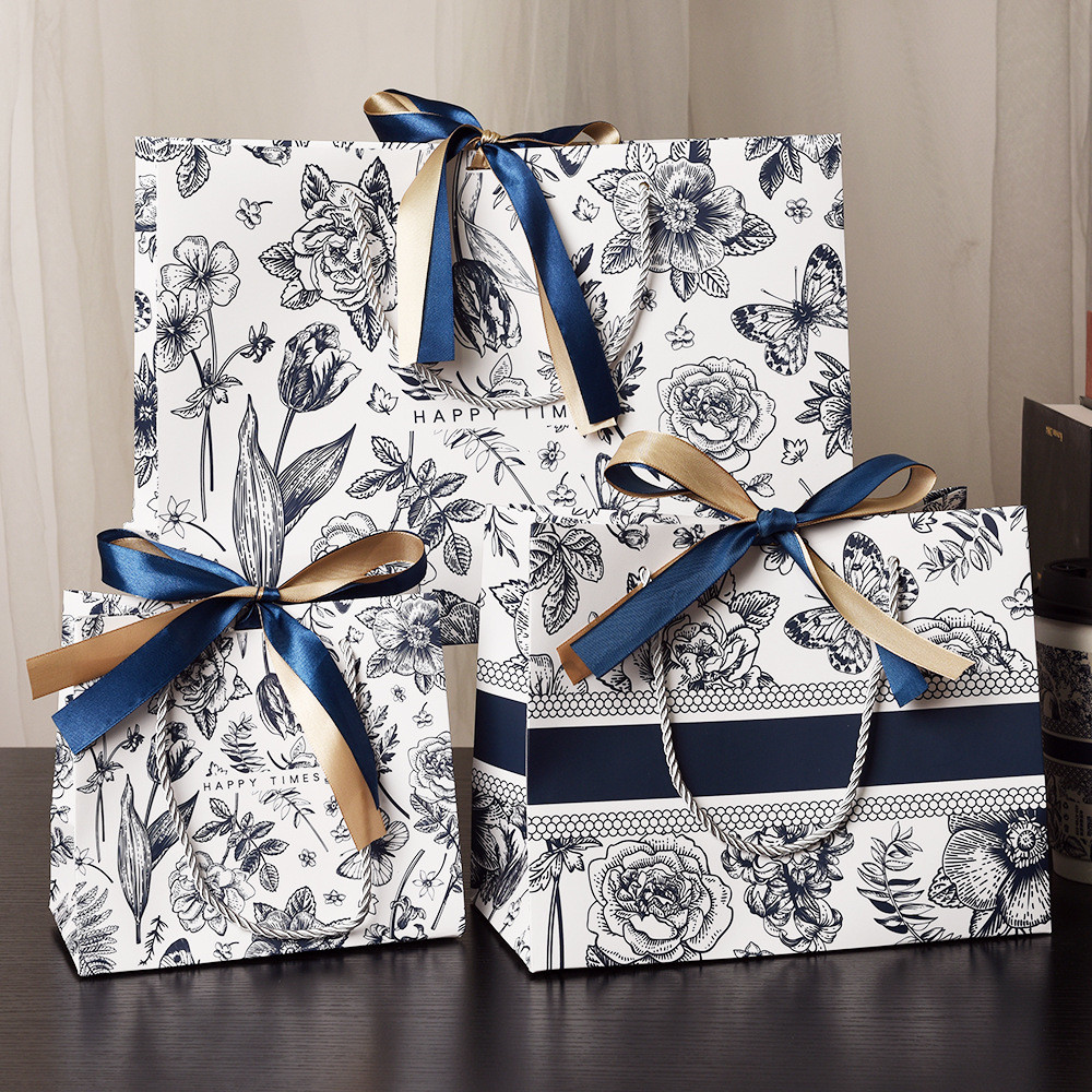 Luxury Custom Paper Bags With Customized CMYK Print And Bow Handle