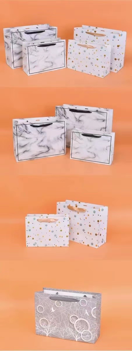 20*28cm 26*35cm 32*43cm Cosmetic Paper Bags With Ribbon Handles