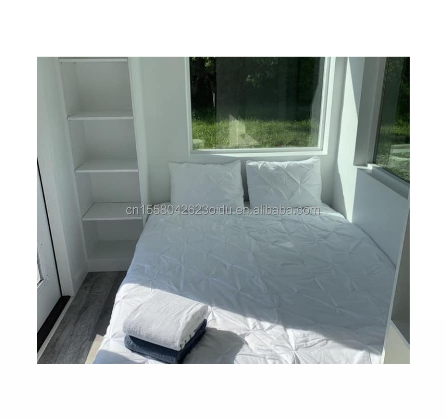 50/75/100mm Wave Sandwich Panel Wall Customizable Design 40ft Modified Shipping Container House for Living or Vacation