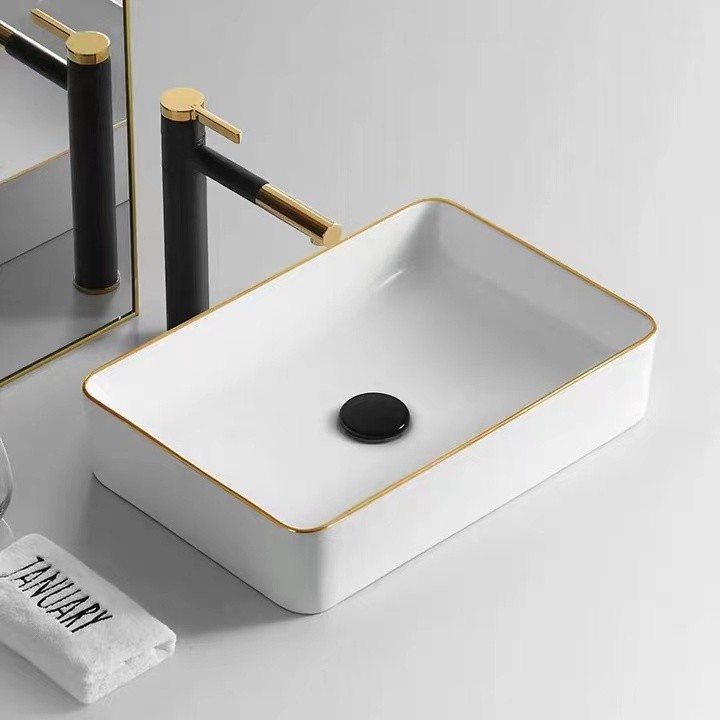 Waterfall Black Basin Faucet With Golden Handle Hot And Cold Mixer