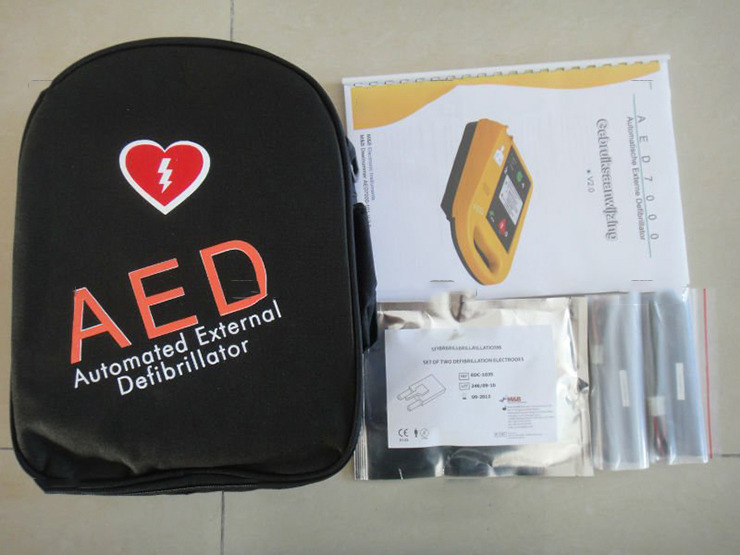 portable AED cardiac defibrillator pads analyzer automatic external defibrillator