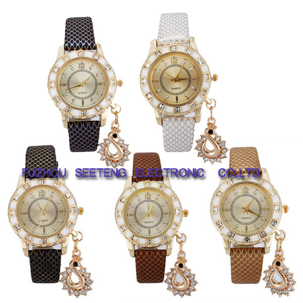 snakeskin texture PU leather band and golden diamond inset case with a hanging drop for ladies watches