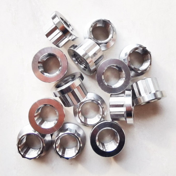 Universal Silver 1/2" -20 Titanium 12 PT Flange Nuts The Ultimate Combination of Strength and Versatility in Silver