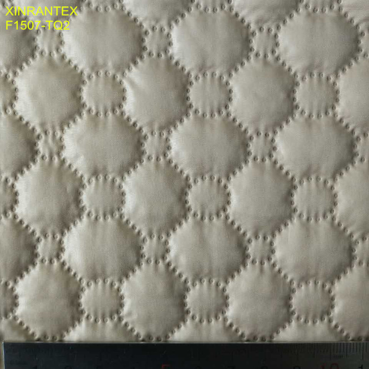 F1507-TQ1 ultrasonic embossing laminating 100% polyester termo qualiting fabric for winter heavy downcoat