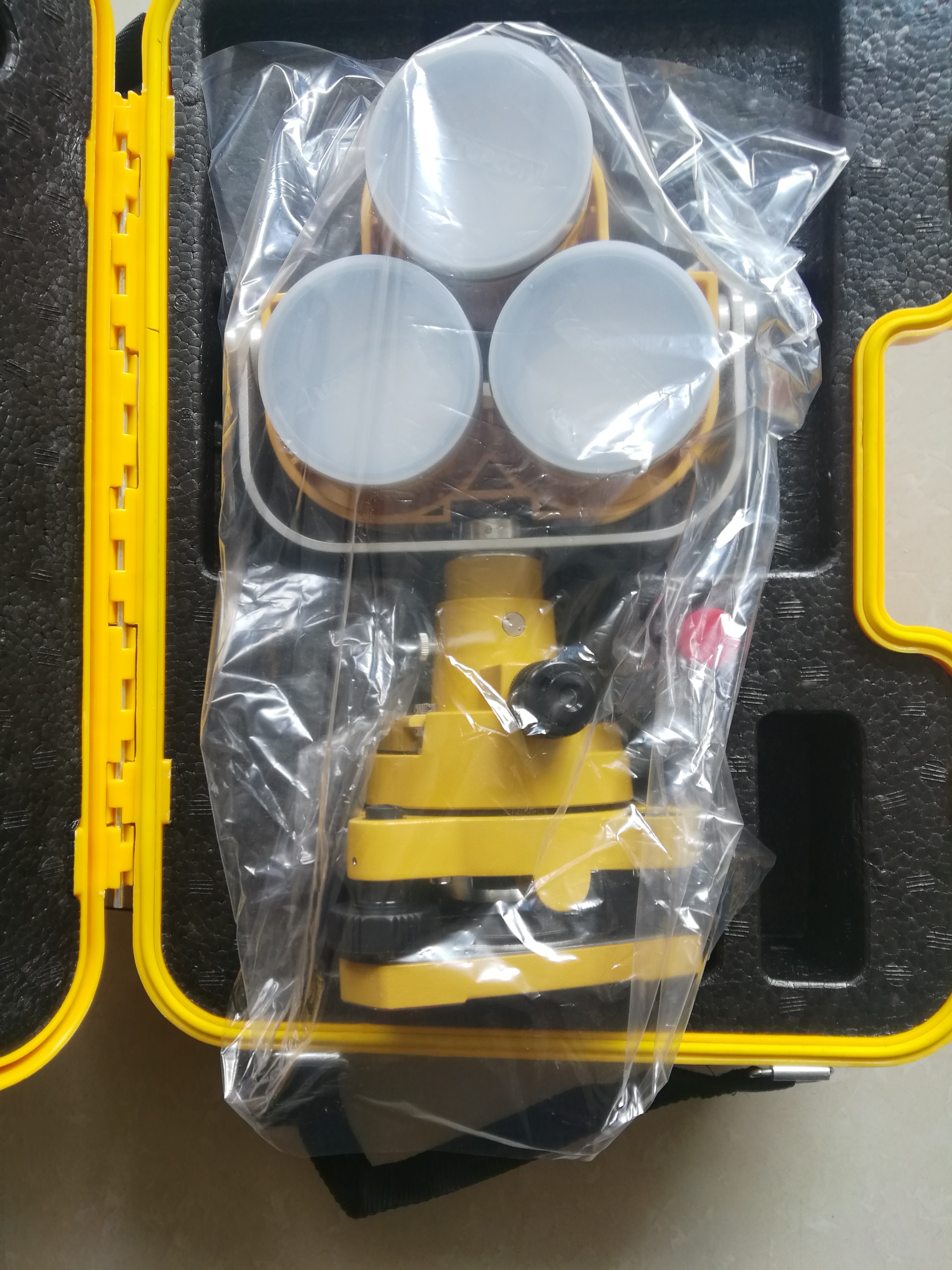 Topcon Type Triple prism set with tribrach and adapter with the plastic case