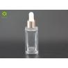 Buy cheap 30ml Clear Glass Empty Cosmetic Bottles Square Shape For Essential Oil / Lotion from wholesalers