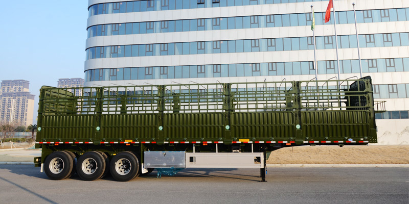 CIMC 12400*2500*2000mm Curb weight 7T 12.4M 3 Axle 10pcs leaf spring 19T single action outrigger 40T payload Stake Semi Trailer