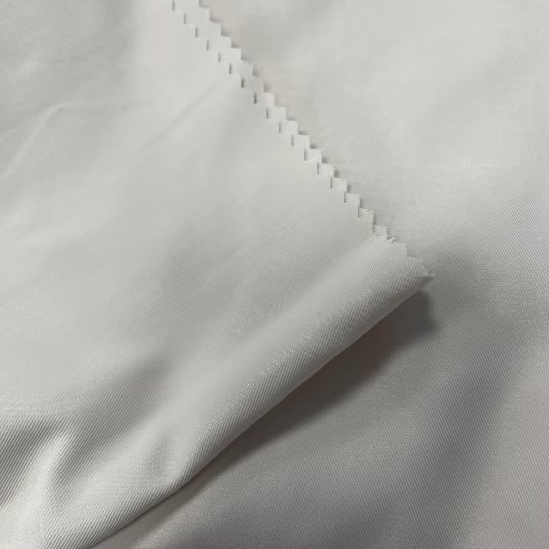 205GSM 100%P 110D*150D High elastic fabric