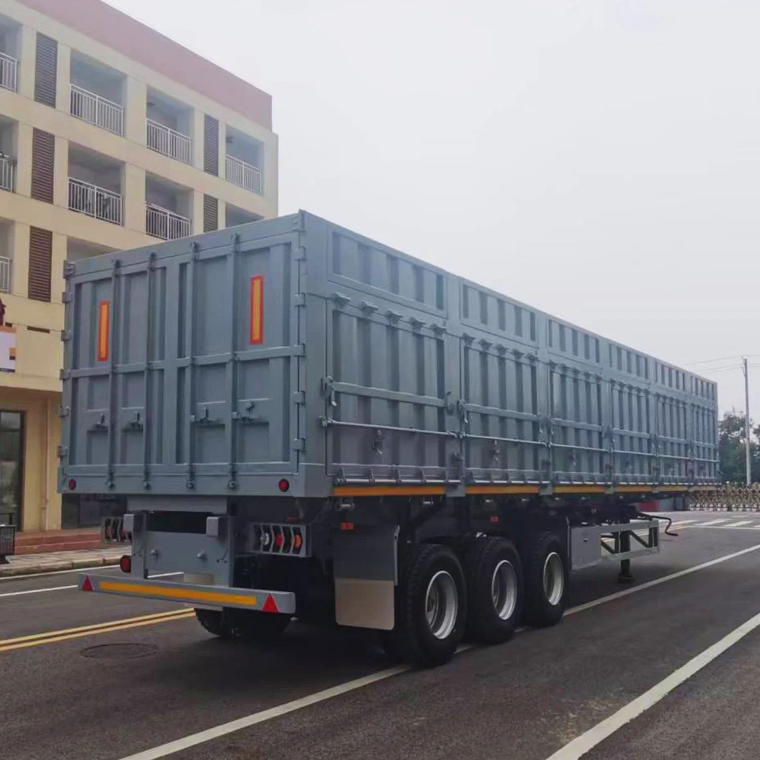 CIMC heavy duty leaf spring suspension 13.2 M 3 Axle Van Type Gooseneck Side Dump box tipper Semi-Trailer